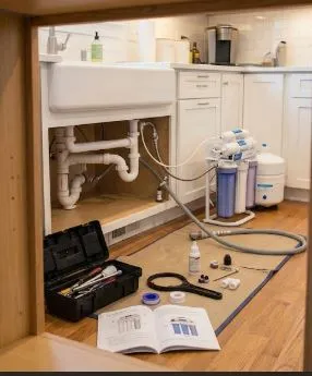 Water Filtration Installation Montreal — licensed plumber installing under-sink filtration system